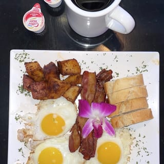 #68 3 Eggs, Baguette, Bacon, Homestyle Potatoes, And Brew Coffee